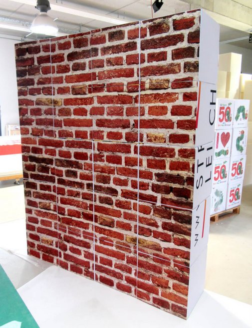 Puzzlewand wirkt wie eine Backsteinmauer